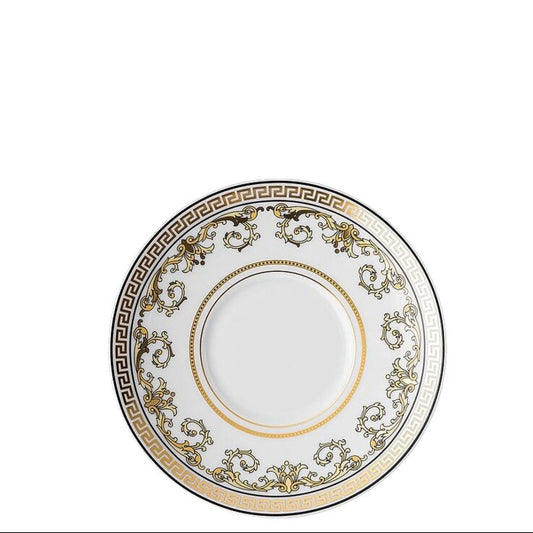 Decorative plate with intricate patterns on a white background
