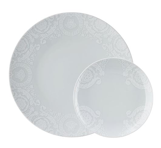 Versace Barocco '92 Bianco porcelain collection by Rosenthal meets Versace featuring white relief Medusa and Baroque motifs.