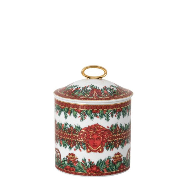 Decorative ceramic jar with a festive design on a white background
