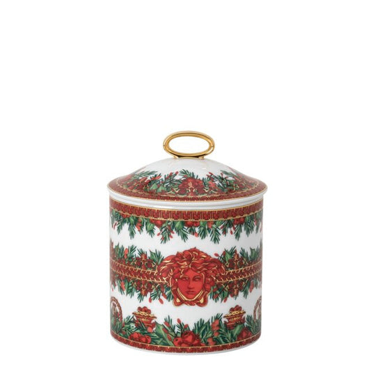 Decorative ceramic jar with a festive design on a white background
