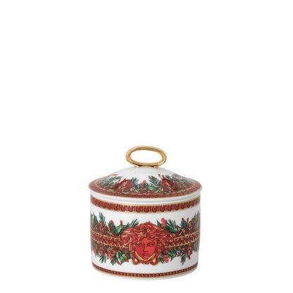 Decorative ceramic jar with floral design on a white background