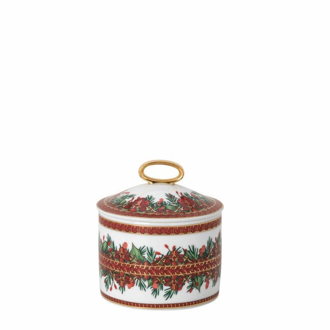 Decorative ceramic jar with a festive design on a white background