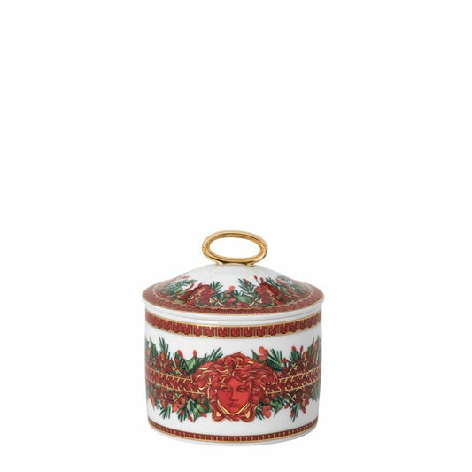 Decorative ceramic jar with floral design on a white background